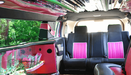 Pink Hummer limousine with wet bars